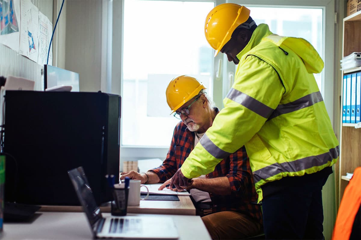 Dept Workers Reviewing Permit