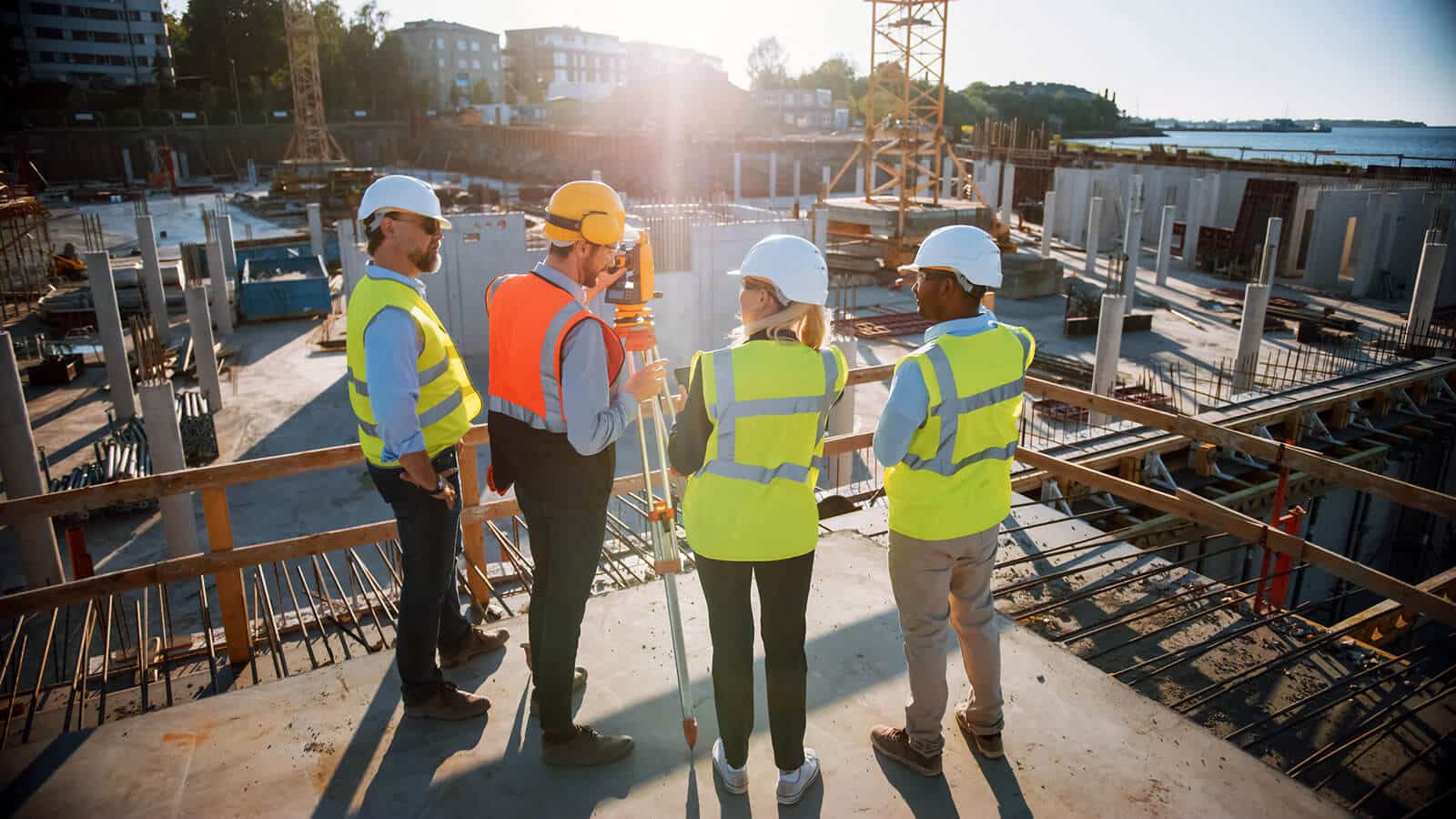 Engineers overlooking construction site